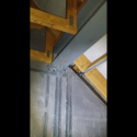 Inadequate support under a steel universal beam in a timber framed structure