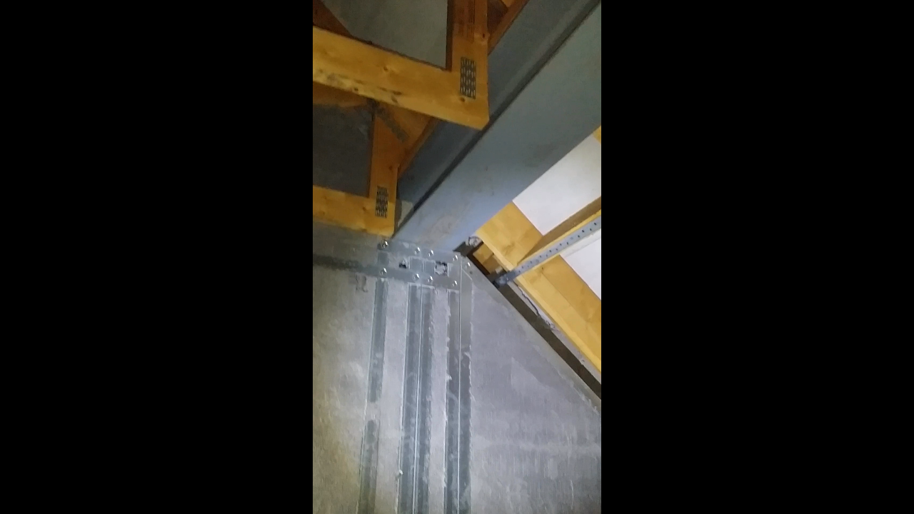 Inadequate support under a steel universal beam in a timber framed structure