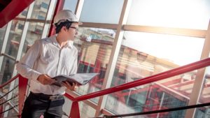 Male Engineer checking commerical buildings