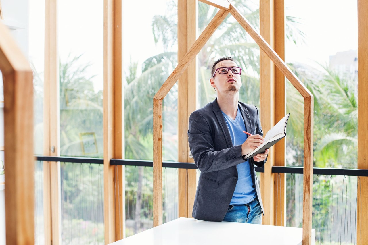 Male Engineer performing house inspection