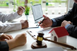 Solicitor discussing queries with a couple