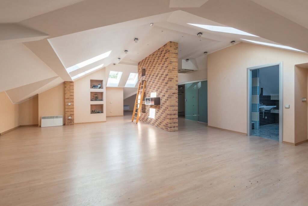 Converted attic with brick wall